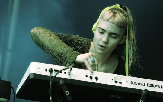 Grimes Offers 50% Royalties on AI-Generated Music Using Her Voice